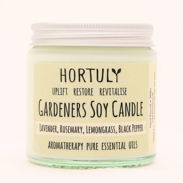 Hortuly Gardeners aromatherapy candle in a clear glass jar with an aluminium lid